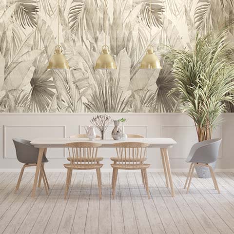 Bridgemoor Pendant in Modern Brass hanging in a dining room space