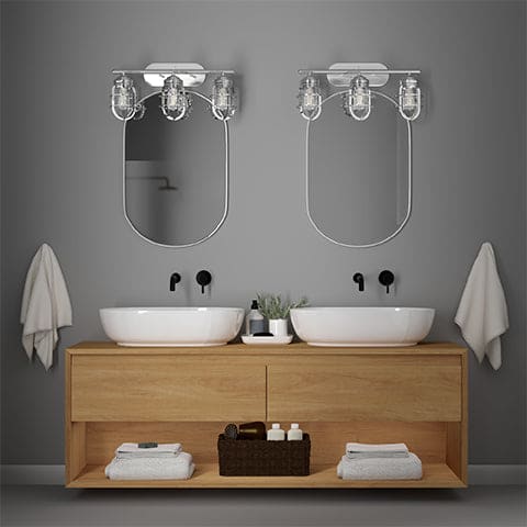 Two Starlake 3 Light vanities in Chrome hanging in a bathroom above two sinks