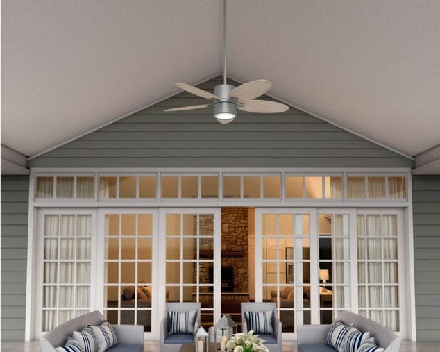 Outdoor patio scene with tropical Amaryllis outdoor ceiling fan in matte silver finish