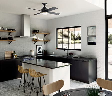 Casablanca's Daphne in Matte Black hanging in a modern kitchen space above a kitchen island.
