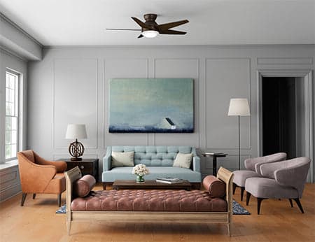 Casablanca's Isotope fan in Brushed Cocoa hanging in a modern living room space.