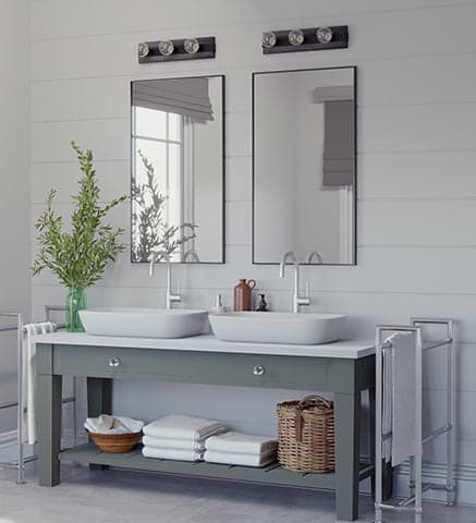 Hunter Donelson Rustic Vanity Lighting in a bathroom