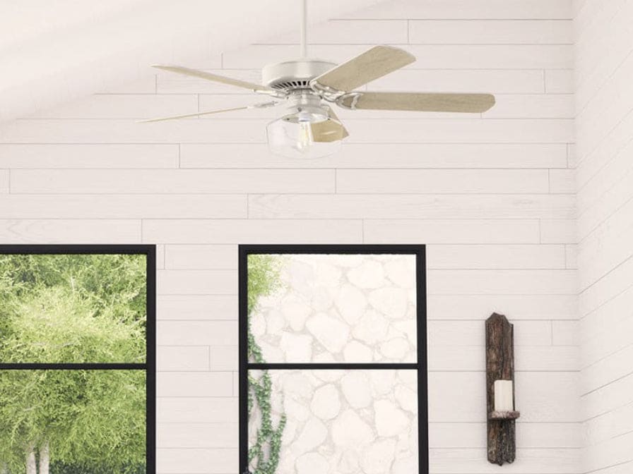 Living space featuring the Panama Sun ceiling fan with light in fresh white finish