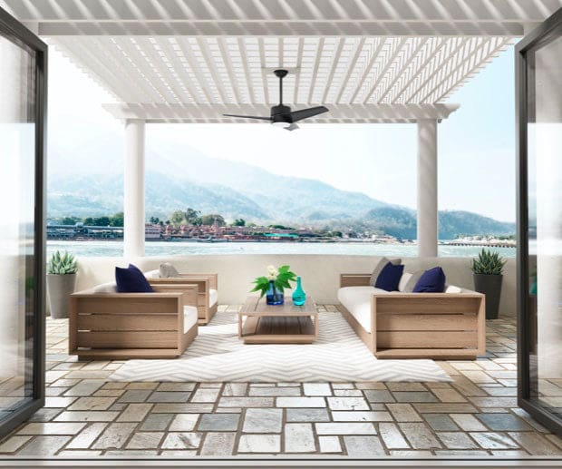 Waterfront patio with pergola and Havoc ceiling fan