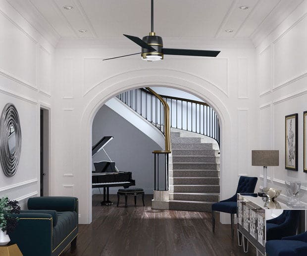 Bureau ceiling fan in modern entryway with black blades and brass accents