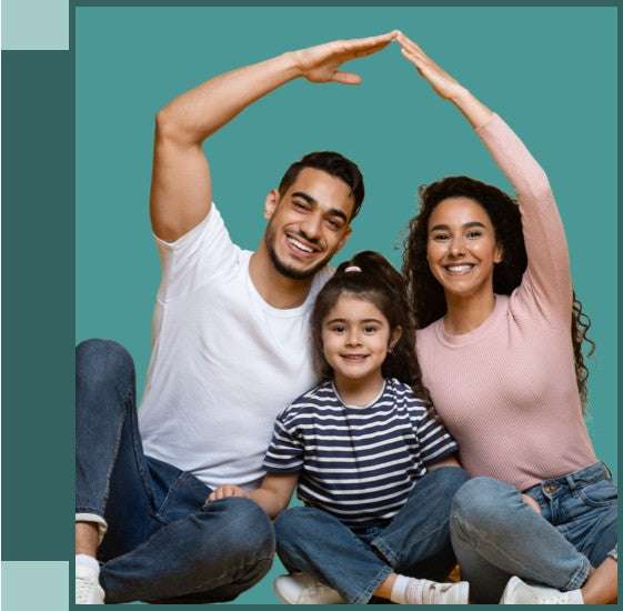 Happy family making the shape of a house.