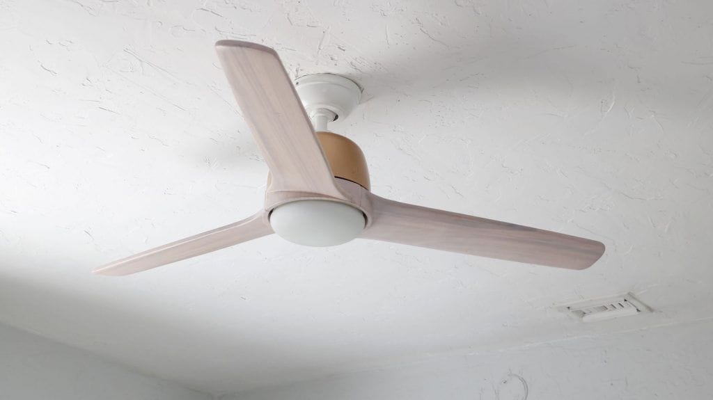 Huntervention Palm Springs AirBnB modern guest bedroom with Hunter modern blush pink and copper ceiling fan with remote