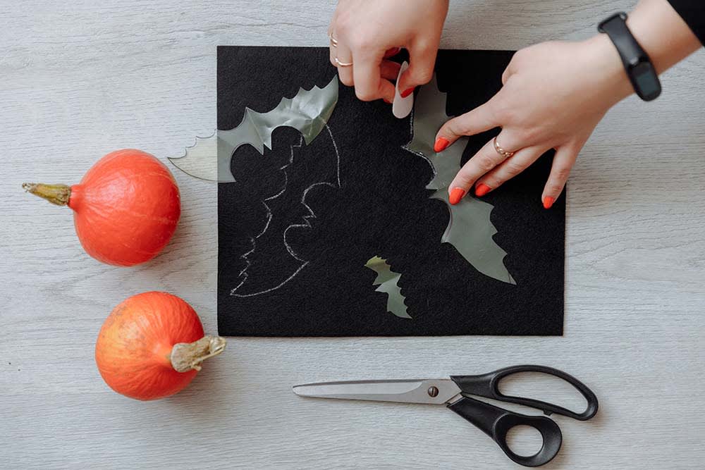 paper cut out bat craft decorating for Halloween
