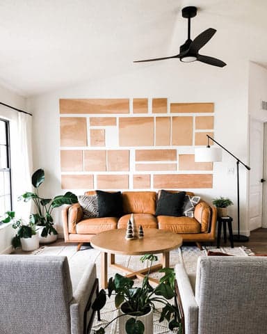 Parkview fan in Matte Black hanging in a modern living room space