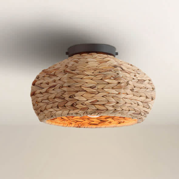 Cambria flush mount with natural seagrass shade on white ceiling.